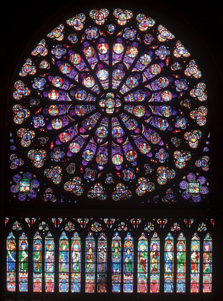 Južna rozeta, Notre-Dame, Pariz: zmagoslavni Kristus Kralj, ki ga v nebesih obdajajo njegovi pričevalci.